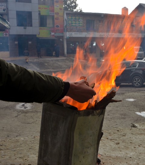 Warming hands, Murree travel spot, Pakistan
