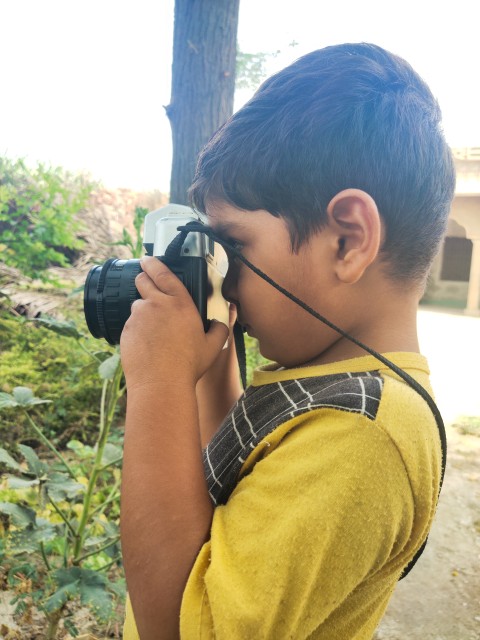 A cute baby photographer, Educational stock footage