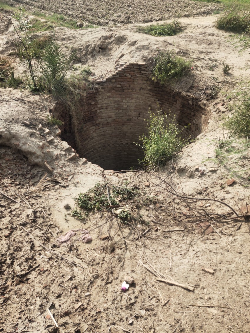A dilapidated well in the village