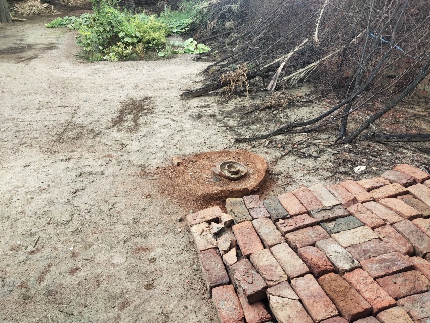 An earthen stove that is breaking down over time due to weathering