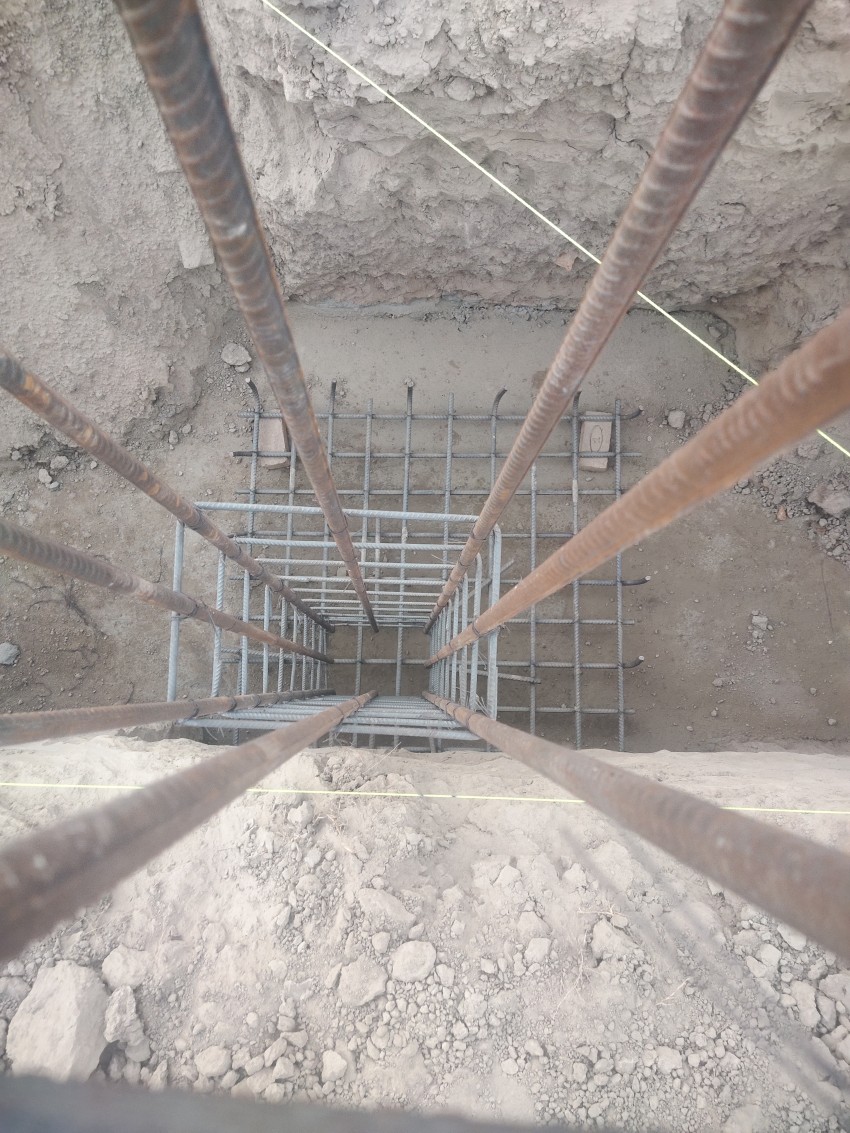 An iron net and pillars have been erected in the foundation, which looks like this