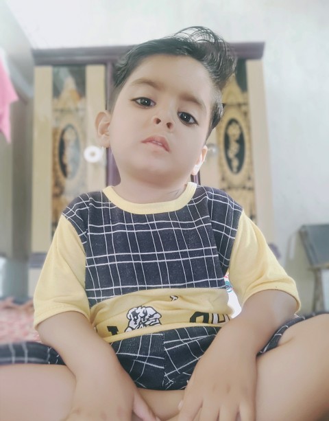 Baby boy in serious mode action