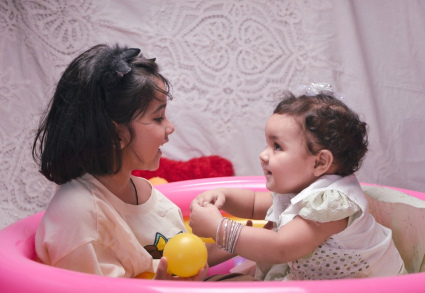 Baby photography   eye staring with preschooler
