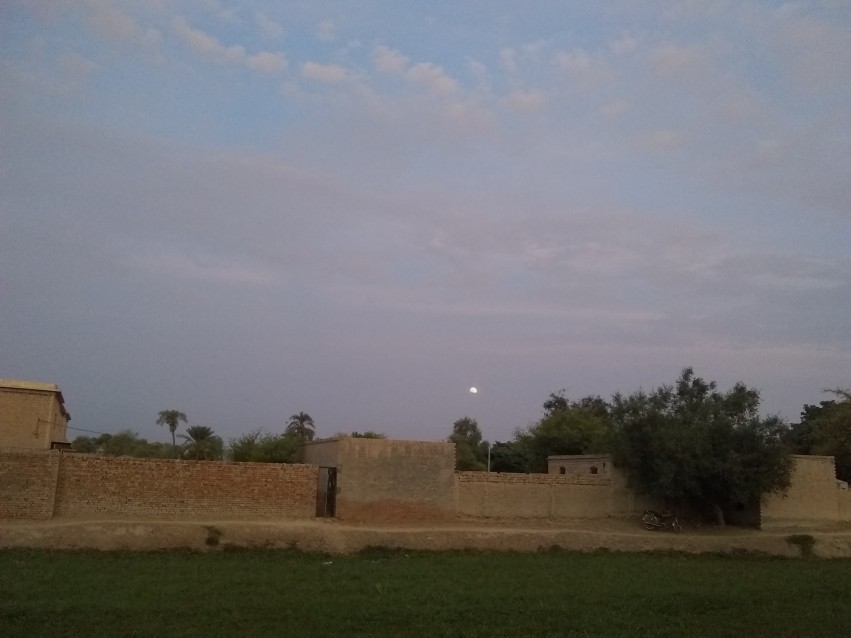 Beautiful view of the setting sun and the moon