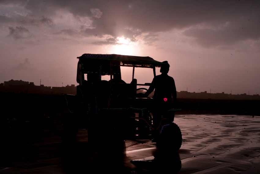 Cart and Driver Silhouette at Sea View, Karachi
