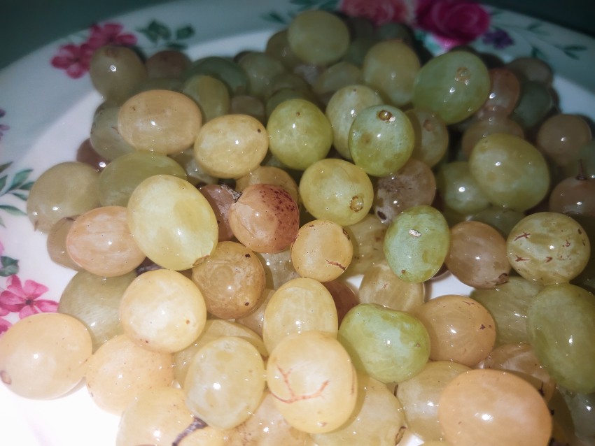 Close-up view of grapes on a beautiful plate.