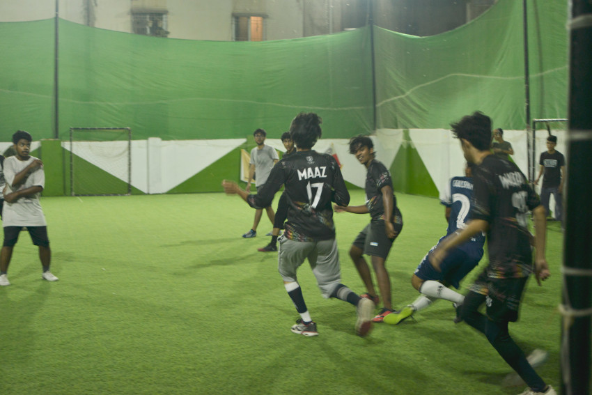 Futsal court Karachi team playing in a green floor ground night match