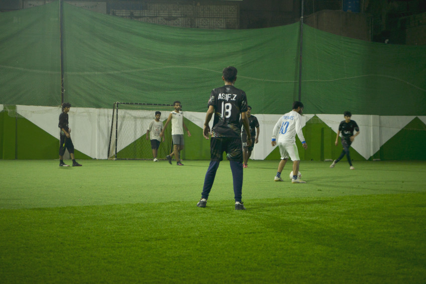 Futsal court Karachi team playing in a green floor ground night match