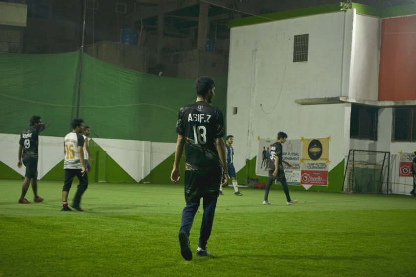 Futsal court Karachi team playing in a green floor ground night match
