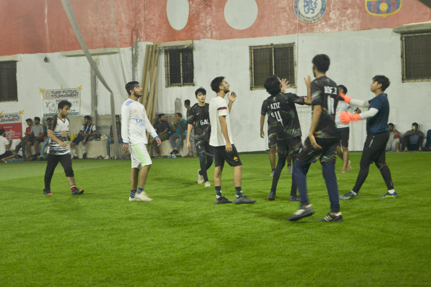 Futsal court Karachi team playing in a green floor ground night match