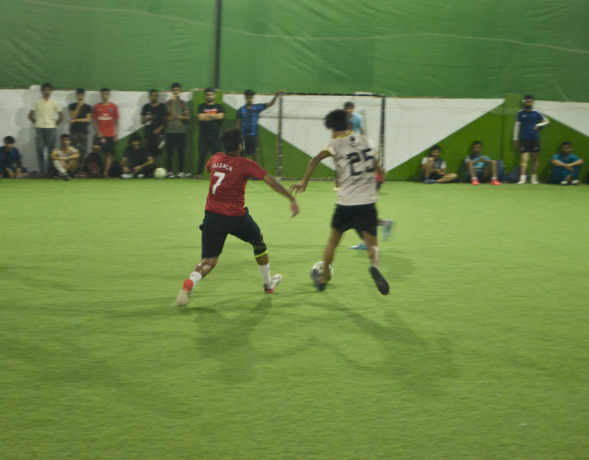 Futsal court Karachi team playing in a green floor ground night match