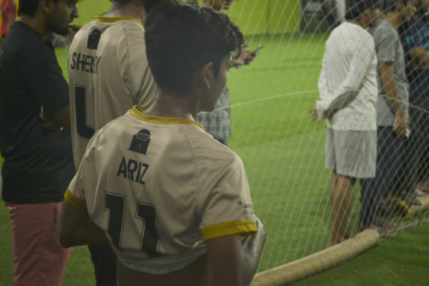 Futsal court Karachi team playing in a green floor ground night match