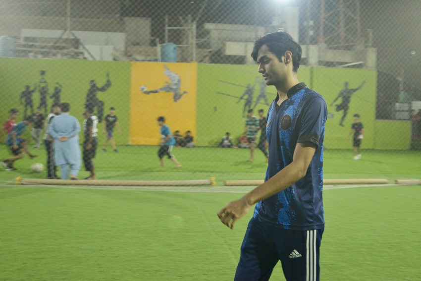 Futsal court Karachi team playing in a green floor ground night match