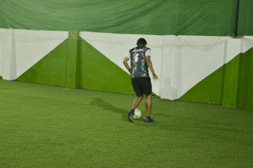 Futsal court Karachi team playing in a green floor ground night match