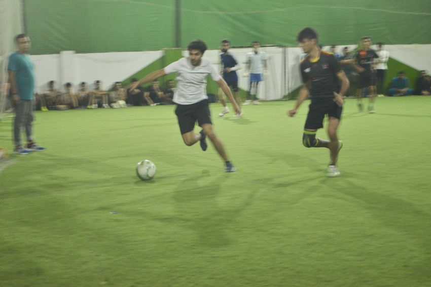 Futsal court Karachi team playing in a green floor ground night match