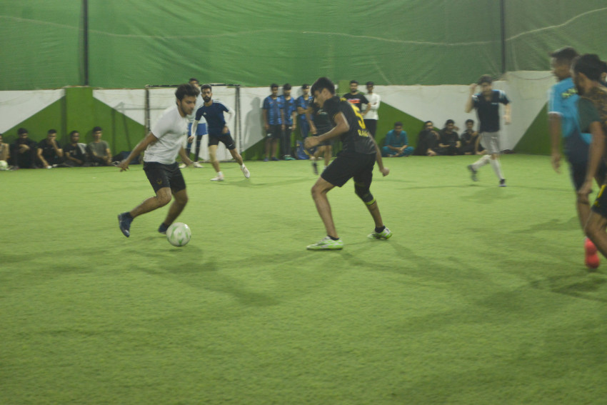 Futsal court Karachi team playing in a green floor ground night match