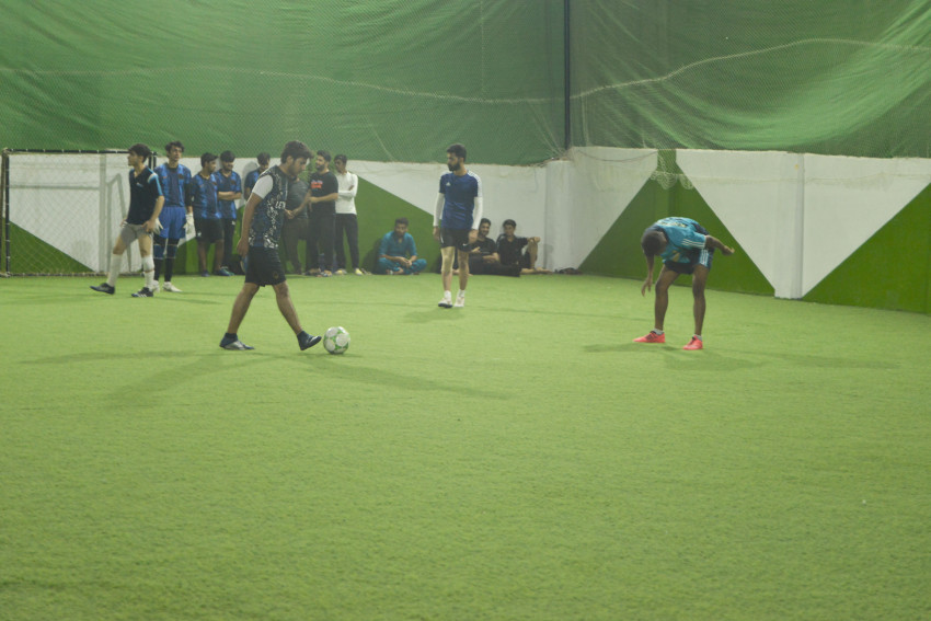 Futsal court Karachi team playing in a green floor ground night match