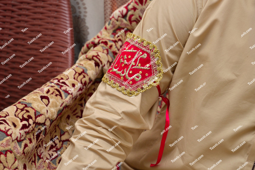 Groom with Imam Zamin tied to his arm in his shadi wedding