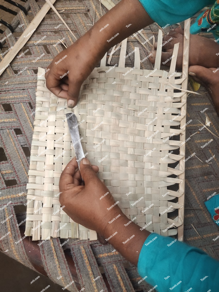 Home made hand fan in the Village