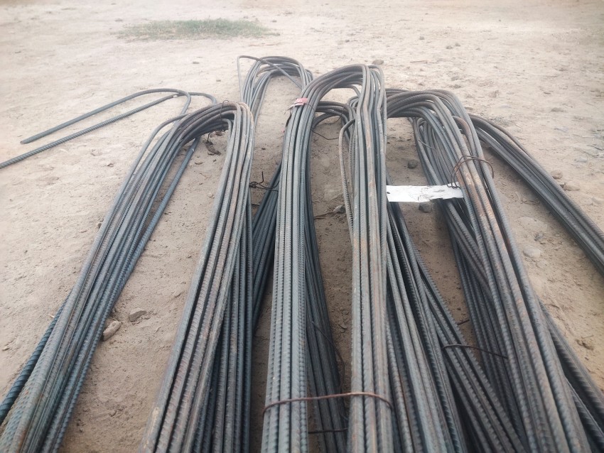 Iron rods tied with wire, Industrial stock footage
