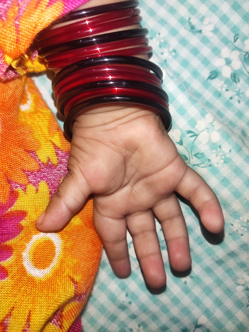 Newborn baby's hand when she sleeps