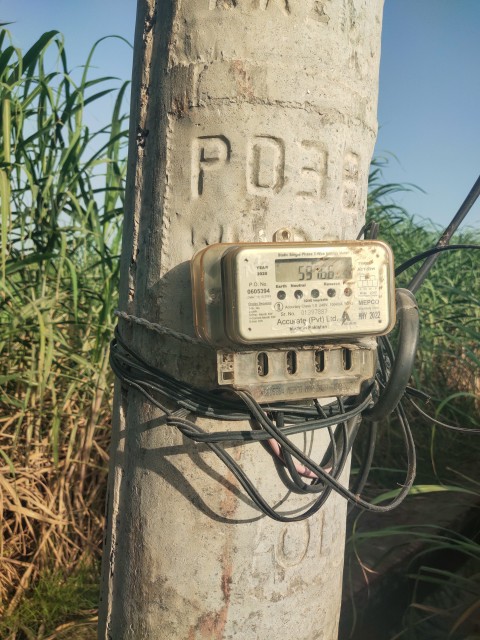 Pakistani electricity meter with cement poll