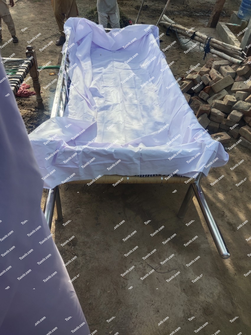 Shrouds (Kafan) and empty Cot carrying the dead.
