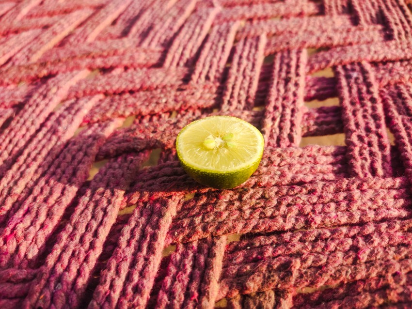 Side view of sliced lemons placed on a cot.