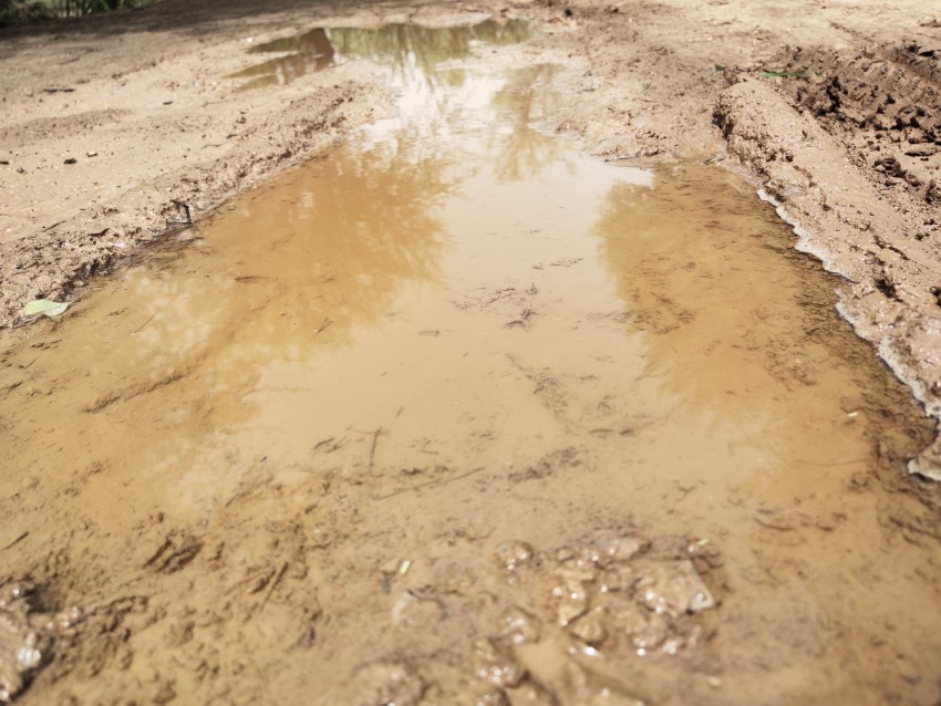 The road in Punjab is muddy due to rainwater