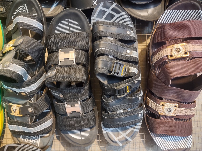 Various types of slippers, sandals for little boys