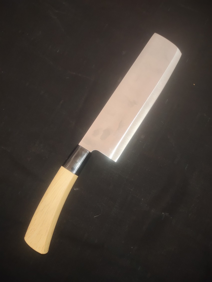 Vegetable cutting knife with black background