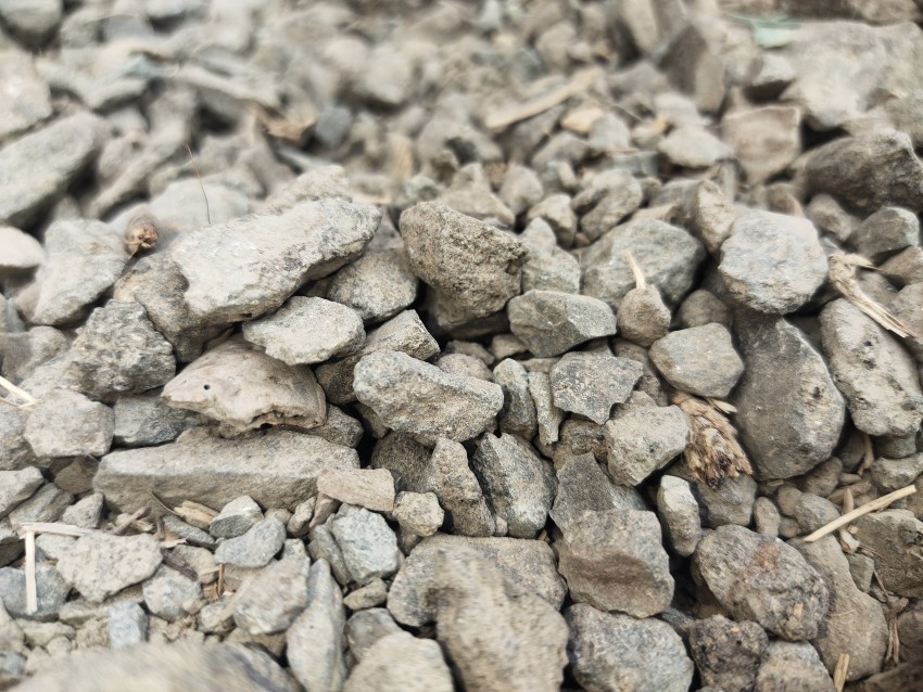 View of concrete stones placed on the roadside